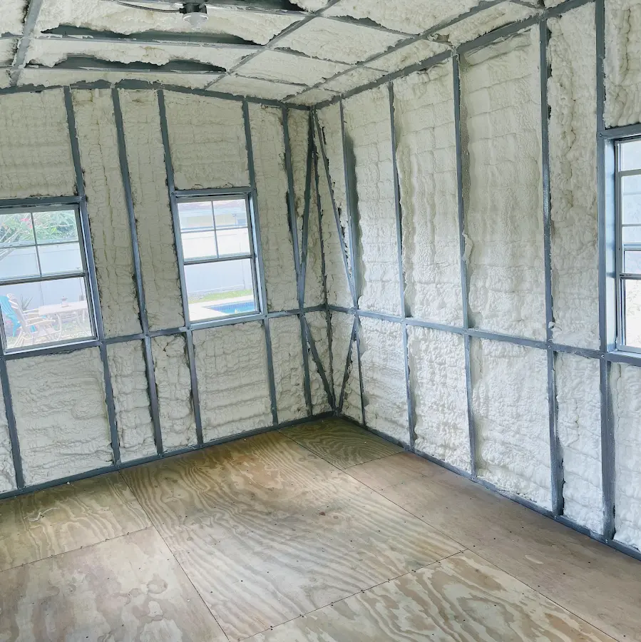 Closed-cell spray foam insulation applied to wall cavities in a residential project in Ellicott
